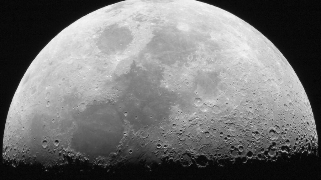 Comparison of the near side and far side of the Moon as seen from Earth