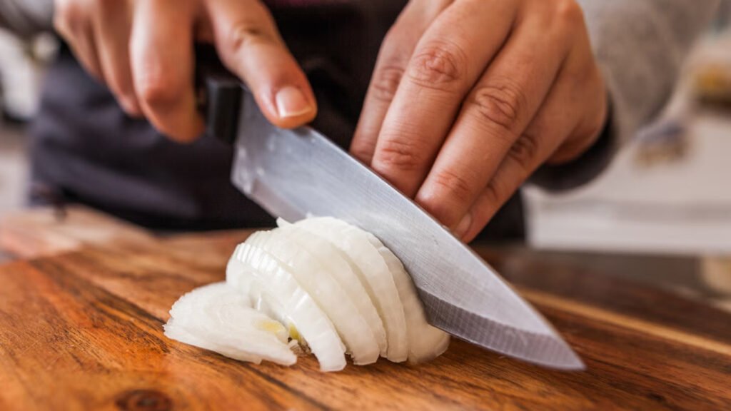 Why do eyes water when chopping onions - the process of cutting an onion