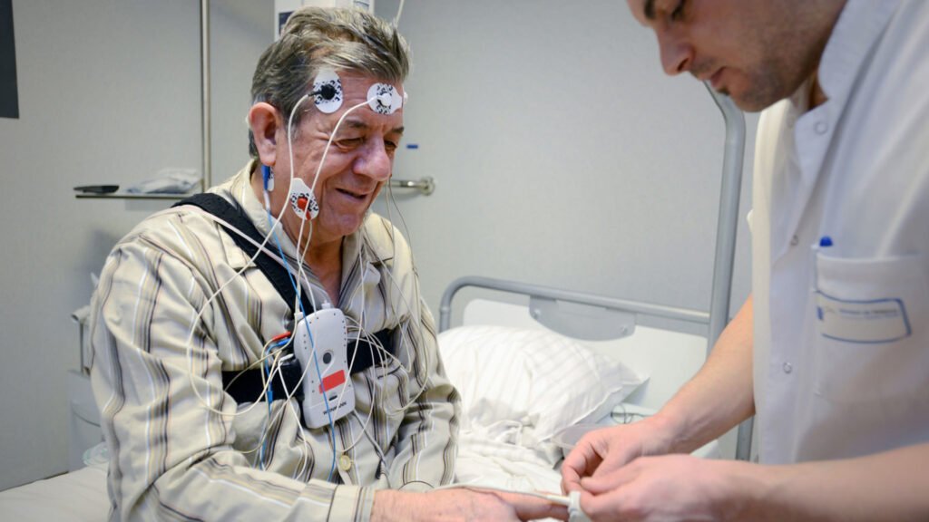 A sleep laboratory setup for polysomnography to study dream patterns.